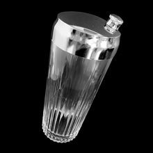 Load image into Gallery viewer, Vintage Art Deco Cocktailer glass cocktail shaker and chrome lid features a varying height vertical rib gothic pattern. Crafted by Indiana Glass, USA, 1950s. A stunning piece to add to your barware collection!
In used vintage condition, no chips, chrome very minor wear.
Measures 3 5/8 x 10 inches
Capacity 32 ounces