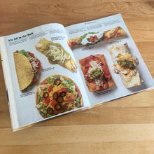 Load image into Gallery viewer, Better Homes and Gardens is known for its fabulous cookbooks. This hardcover cookbook focuses on Cooking Mexican recipes. Its 96 pages are filled with amazing recipes along with many colour photographs. Originally published by Meredith Corporation, USA, 1986. This is the second printing, 1986. In great vintage condition with normal age-related yellowing.