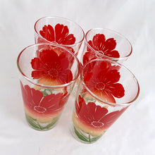 Load image into Gallery viewer, A delightful set of four highly collectible vintage Swanky Swig promotional glass tumblers featuring the tri-colour red yellow green "Cosmos" pattern. Crafted by Federal Glass, USA, between 1940-1949. These colourful and vibrant glasses are sure to liven up your tablescape! In excellent condition, free from chips/wear. Marked on the bottom. Measures 2 7/8 x 4 3/4 inches Capacity 10 ounces