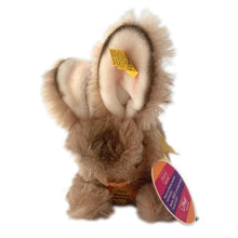 Load image into Gallery viewer, Vintage stuffed animal tan light brown bunny rabbit. Washable Dralon plush material. Hand embroidered pink nose and brown mouth, brown glass eyes with black pupils, and light beige felt rear foot pads. Gold satin ribbon and round red, blue and yellow tag bearing the name Cosy Mummy. Brass button-in-ear yellow and black tag 494020 and paper tag. Steiff, Germany 1970s. This bunny rabbit sits in a seated or reclining position. In excellent condition. Measures 8 1/2 inches or 22cm