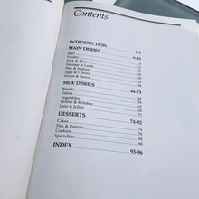 Load image into Gallery viewer, Better Homes and Gardens is known for its fabulous cookbooks. This hardcover cookbook focuses on country cooking recipes and designs. Its 96 pages are filled with amazing recipes along with many colour photographs. Originally published by Meredith Corporation, USA, 1983. This is the third printing 1984. In great vintage condition with normal age-related yellowing.