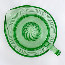 Load image into Gallery viewer, Hard to find vintage green uranium depression glass Criss Cross citrus reamer. Glows brilliantly under black light! Every home should have one of these practical kitchen helpers that makes squeezing citrus fruits a breeze! Crafted by Hazel-Atlas Glass, USA, 1930s. Perfect for the fresh squeezed juice enthusiast...no sugar added!
In excellent condition, no chips/wear.
Measures 5 3/4 x 3 1/2 inches