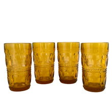 Load image into Gallery viewer, Vintage honey gold "Crown" 12oz flat glass tumblers. These vibrant amber glasses add a retro touch to your drink and barware. Crafted by Colony Glass, USA, between 1964 - 1967. These iconic glasses are perfect for entertaining or for everyday use! In excellent condition, free from chips. Measures 3 x 5 1/2 inches Capacity 12 ounces