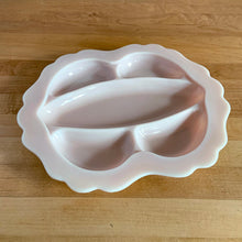 Load image into Gallery viewer, Rare vintage "Crown Tuscan" pink milk glass relish or vanity tray features five sections finished with a wide scalloped edge. Crafted by Cambridge Glass, USA, 1940s. This stunning pale pink milk glass tray is sure to add an elegant touch to your tablescape or dresser. In good vintage condition, with a flea bite to the inner rim which does not detract from the beauty of this piece. Measures 12 1/4 x 10 1/2 inches