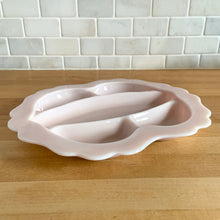 Load image into Gallery viewer, Rare vintage "Crown Tuscan" pink milk glass relish or vanity tray features five sections finished with a wide scalloped edge. Crafted by Cambridge Glass, USA, 1940s. This stunning pale pink milk glass tray is sure to add an elegant touch to your tablescape or dresser. In good vintage condition, with a flea bite to the inner rim which does not detract from the beauty of this piece. Measures 12 1/4 x 10 1/2 inches