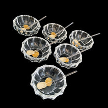 Load image into Gallery viewer, Vintage set of six crystal salt cellars and spoons. Crafted by Bohemia Crystal, circa 1950s. A lovely addition to your tablescape. While the cellars and spoons are new in box, some have rough edges from mold release. Each piece has the original yellow sticker which read Bohemia Crystal, Made in Czechoslovakia. Salt cellars measure 2 3/8 x 7/8 inches. Spoons measure 2 3/4 inches
