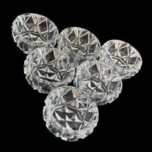 Load image into Gallery viewer, Vintage set of six crystal salt cellars and spoons. Crafted by Bohemia Crystal, circa 1950s. A lovely addition to your tablescape. New in box in excellent vintage condition. Each spoon is wrapped and has the original yellow sticker which reads Bohemia Crystal, Made in Czechoslovakia. Salt cellars measure 1 5/8 x 7/8 inches. Spoons measure 2 3/4 inches
