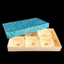 Load image into Gallery viewer, Vintage set of six crystal salt cellars and spoons. Crafted by Bohemia Crystal, circa 1950s. A lovely addition to your tablescape. While the cellars and spoons are new in box, some have rough edges from mold release. Each piece has the original yellow sticker which read Bohemia Crystal, Made in Czechoslovakia. Salt cellars measure 2 3/8 x 7/8 inches. Spoons measure 2 3/4 inches