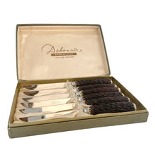 Load image into Gallery viewer, Vintage Debonair faux antler handled stainless steel steak knives in original silk lined box. Crafted by MB Hollow Ground, Japan, 1950s. Add the lodge look to your table settings with these unique knives.
In excellent condition, new in box.
Knife measures 8 3/8 inches