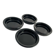 Load image into Gallery viewer, A vintage set of deep red, almost black pressed glass coasters in brass metal caddy. So handy for entertaining or everyday use! These sets were typically sold at high-end retailers like Birks Canada. In excellent condition, the glass is free from chips/cracks. Each coaster measures 3 3/4 x
