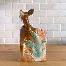 Load image into Gallery viewer, Vintage mid-century hand painted figural deer fawn ceramic planter. Crafted by Shafford, Japan, circa 1950s. This sweet piece will look great as part of your home's decor. Fill with your favourite houseplant and enjoy!  In excellent condition, chip to the interior rim (see photos), no cracks/repairs.  Measures 3 1/2 x 2 3/4 x 6 1/4 inches