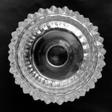 Load image into Gallery viewer, A great way to either start or add to your collection, this vintage two-piece Diamond Point clear glass fairy lamp fits the bill. Use with a traditional wax or battery operated candle. Crafted by Indiana Glass , USA, 1965 - 1990. The foot of the base is a charming flower shape. The perfect piece to add warm glowy ambience to any room!
In excellent condition no chips.
Measures 4 1/2 x 6 inches