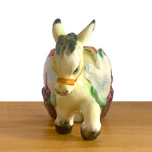 Load image into Gallery viewer, Vintage figural donkey and cart, colourful ceramic planter, shape S3364. Crafted in Japan, 1960s. Perfect for your favourite houseplant, succulent or repurpose as a pen/pencil or make-up brush holder.
In excellent condition, no chips/cracks/repairs.
Measures 7 x 4 x 5 inches