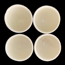 Load image into Gallery viewer, Overhead view of three excellent condition Hankscraft egg cups alongside one with crack, 1940s USA
