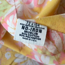 Load image into Gallery viewer, Vintage Dream Garden flat twin sheet featuring a flower power pattern in shades of pink, yellow, green and white. 50% polyester / 50% cotton. Crafted by St. Mary’s, USA, 1970/71. A beautiful addition to your retro boho bedding decor, or repurpose for crafting.
In as found vintage condition.
Sheet #1 has one small hole and a 2-1/2 inch tear near the bottom of the sheet that been poorly mended.
Sheet #2 has two small holes. Please see photos.
Measures 72 x 104 inches
