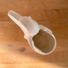 Load image into Gallery viewer, Vintage gloss white Duck and Egg planter. Crafted by McCoy Pottery, 1950s. This rare planter must for any art pottery collector!
In used vintage condition, no chips/repairs, tight hairline at the back of the egg, cold paint has rubbed off. McCoy mark on the bottom.
Measures 7 x 3 1/4 x 5 1/4 inches