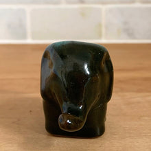 Load image into Gallery viewer, Blue Mountain Pottery elephant figurine, straight-on front view — green drip glaze body, raised trunk, four sturdy legs