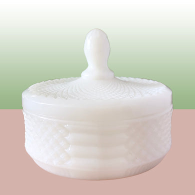 Vintage English Hobnail Milk Glass round lidded dish. Crafted by Westmoreland Glass, USA, circa 1950s. A versatile piece of home decor that may be used for candies, trinkets, bath accessories, or to store small office supplies. In excellent condition, free from chips. Measures 5 x 4 inches