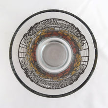 Load image into Gallery viewer, Vintage retro Coca-Cola promotional glass featuring a colourful flower power graphic illustration in an ombre of red, orange and yellow outlined in black. The word "Enjoy" sits above the distinctive Coke logo in a oval medallion reminiscent of a stained glass window. Makers mark is impressed on the bottom, however, we're unable to assign it to a specific maker. In excellent, like new condition, free from chips.