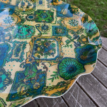 Load image into Gallery viewer, This FAB serving tray screams retro style with its vibrant blue, green, yellow and teal framed medallions of flowers, geometric objects and birds. Made by pressing gorgeous decorator fabric between 2 layers of a light-weight plastic material which was heat molded into a tray with a sweet ruffled edge. Produced by Hardy Glenwood in Canada, circa 1960/70. The perfect accessory for entertaining! In excellent used condition. Measures 17 1/4 inches