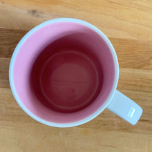 Load image into Gallery viewer, Perfect for your morning cuppa joe! This fabulous collectible FLORIDA ceramic mug was produced by Starbucks as part of their "Been There Series" Across The Globe Collection, 2017. A white ceramic mug printed design in shades of pink and green with pink interior. Celebrate the sunshine state! In excellent condition, free from chips/cracks/wear. Measures 3 5/8 x 3 3/8 inches Capacity 14 ounces