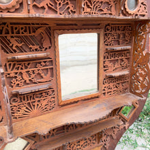 Load image into Gallery viewer, Incredible primitive antique Father Time handmade wood scroll saw wall hung shelf depicting the months of the year with scenes of figures, flora and fauna including birds, rabbits and flowers depicting an activity appropriate to the month, topped with a lounging Father Time with sycthe and hourglass. There are a total of 10 shelves which are notched together and removable, in addition there are 4 mirrors. In as found condition with a corder of the backboard damaged.