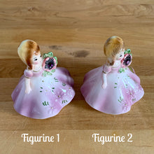 Load image into Gallery viewer, This sweet vintage mid-century figurine is one of the Birthday of the Month series designed by Josef Originals, Japan, 1950s. This sweet black-eyed girl is beautifully styled wearing a full length gown, hand painted in purple with raised flowers, holding a purple flowers with an amethyst birthstone in the centre of the flower. In excellent condition, free from chips/cracks/repairs. Marked on the bottom with the Noritake for Giftcraft mark. Measures 3 1/2 x 4 inches