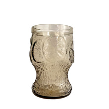Load image into Gallery viewer, Set of six vintage smokey brown glass tumblers featuring an embossed floral and fruit design. Crafted by Fidenza Vetraria, Italy, 1970s. Perfect for everyday use or cocktails!
In excellent condition, no chips.
Measures 2 3/4 x 4 3/8 inches
Capacity 10 ounces