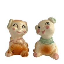 Load image into Gallery viewer, Vintage hand painted Fido and Flossie dogs ceramic salt and pepper shakers with a ceramic tray featuring a green grass area with yellow dog houses at either end. Crafted in Japan, 1940s. A darling set! In excellent vintage condition, no chips/cracks/repairs. Normal crazing present. Tray measures 5 1/4 x 3 x 2 3/4 inches Fido and Flossie 2 1/2 inches tall