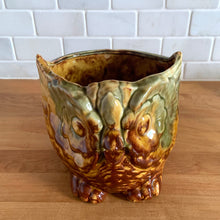 Load image into Gallery viewer, Stunning vintage mid-century drip glazed ceramic figural own planter jardiniere in shades of yellow, ochre, green and rusty brown. Made in the USA, circa 1960s. This highly detailed and collectible planter would be perfect to raise your favourite houseplant or to give as a gift!
In excellent condition free from chips and cracks. It is signed on the bottom and marked USA.
Measures 5 1/2 x 6 x 5 1/4 inches
