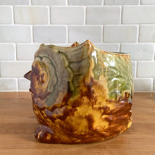 Load image into Gallery viewer, Stunning vintage mid-century drip glazed ceramic figural own planter jardiniere in shades of yellow, ochre, green and rusty brown. Made in the USA, circa 1960s. This highly detailed and collectible planter would be perfect to raise your favourite houseplant or to give as a gift!
In excellent condition free from chips and cracks. It is signed on the bottom and marked USA.
Measures 5 1/2 x 6 x 5 1/4 inches