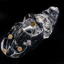 Load image into Gallery viewer, This vintage figural crystal glass seated lion pipe rest is sure to be a conversation starter. Crafted by Art Vannes, France, circa 1960s/70s. With its elegant and powerful presence, this stunning lion may be used as intended, or as a paperweight and candy dish. Whichever your choice, this piece will add an extra touch of sophistication to any corner of your room. In excellent condition, free from chips/wear. Maker's mark on the bottom. Measures 6 3/4 x 2 5/8 x 4 1/2 inches