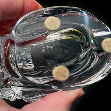 Load image into Gallery viewer, This vintage figural crystal glass seated lion pipe rest is sure to be a conversation starter. Crafted by Art Vannes, France, circa 1960s/70s. With its elegant and powerful presence, this stunning lion may be used as intended, or as a paperweight and candy dish. Whichever your choice, this piece will add an extra touch of sophistication to any corner of your room. In excellent condition, free from chips/wear. Maker's mark on the bottom. Measures 6 3/4 x 2 5/8 x 4 1/2 inches