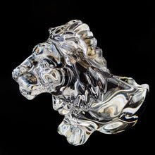 Load image into Gallery viewer, This vintage figural crystal glass seated lion pipe rest is sure to be a conversation starter. Crafted by Art Vannes, France, circa 1960s/70s. With its elegant and powerful presence, this stunning lion may be used as intended, or as a paperweight and candy dish. Whichever your choice, this piece will add an extra touch of sophistication to any corner of your room. In excellent condition, free from chips/wear. Maker's mark on the bottom. Measures 6 3/4 x 2 5/8 x 4 1/2 inches