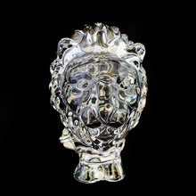 Load image into Gallery viewer, This vintage figural crystal glass seated lion pipe rest is sure to be a conversation starter. Crafted by Art Vannes, France, circa 1960s/70s. With its elegant and powerful presence, this stunning lion may be used as intended, or as a paperweight and candy dish. Whichever your choice, this piece will add an extra touch of sophistication to any corner of your room. In excellent condition, free from chips/wear. Maker's mark on the bottom. Measures 6 3/4 x 2 5/8 x 4 1/2 inches
