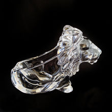 Load image into Gallery viewer, This vintage figural crystal glass seated lion pipe rest is sure to be a conversation starter. Crafted by Art Vannes, France, circa 1960s/70s. With its elegant and powerful presence, this stunning lion may be used as intended, or as a paperweight and candy dish. Whichever your choice, this piece will add an extra touch of sophistication to any corner of your room. In excellent condition, free from chips/wear. Maker's mark on the bottom. Measures 6 3/4 x 2 5/8 x 4 1/2 inches