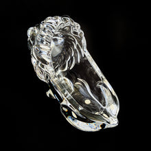Load image into Gallery viewer, This vintage figural crystal glass seated lion pipe rest is sure to be a conversation starter. Crafted by Art Vannes, France, circa 1960s/70s. With its elegant and powerful presence, this stunning lion may be used as intended, or as a paperweight and candy dish. Whichever your choice, this piece will add an extra touch of sophistication to any corner of your room. In excellent condition, free from chips/wear. Maker's mark on the bottom. Measures 6 3/4 x 2 5/8 x 4 1/2 inches