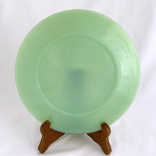 Load image into Gallery viewer, Vintage mid-century Fire-King "Jane Ray" pressed glass jadeite salad plate with ribbed border detail. Produced by the Anchor Hocking Glass Company, USA, during two productions runs between 1945 to 1963 and 1946 to 1965. These plates are highly collectible and suit a number of decor styles. In great vintage condition, free from chips/cracks/repairs. Maker's mark present on the bottom of each piece "OVEN Fire-King WARE, MADE IN U.S.A." as seen in the photo. Measures 7 3/4 inches