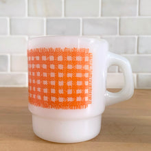 Load image into Gallery viewer, Vintage Fire-King orange gingham mug, side profile showing gingham pattern detail and handle