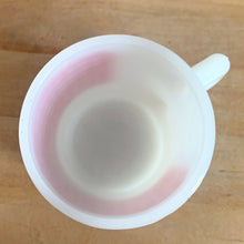 Load image into Gallery viewer, Overhead view of vintage Fire-King red gingham mug, showing interior and rim