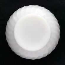 Load image into Gallery viewer, Underside view of vintage Anchor Hocking Fire-King Swirl white milk glass mixing bowl showing the scalloped swirl base pattern and recessed foot ring in opaque white milk glass