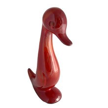 Load image into Gallery viewer, Handcrafted by Blue Mountain Pottery in 1970s Canada, this rare duck figurine exemplifies the studio's mastery of flambé glazing. The redware body is adorned with a sophisticated interplay of burnt orange and deep red hues that pool and streak across the surface, creating an organic, one-of-a-kind finish. A prized addition for collectors of vintage Canadian pottery and mid-century ceramic design with an eye for authentic craftsmanship and historical provenance.