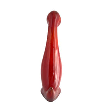 Load image into Gallery viewer, Handcrafted by Blue Mountain Pottery in 1970s Canada, this rare duck figurine exemplifies the studio's mastery of flambé glazing. The redware body is adorned with a sophisticated interplay of burnt orange and deep red hues that pool and streak across the surface, creating an organic, one-of-a-kind finish. A prized addition for collectors of vintage Canadian pottery and mid-century ceramic design with an eye for authentic craftsmanship and historical provenance.