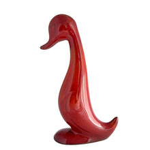 Load image into Gallery viewer, Handcrafted by Blue Mountain Pottery in 1970s Canada, this rare duck figurine exemplifies the studio's mastery of flambé glazing. The redware body is adorned with a sophisticated interplay of burnt orange and deep red hues that pool and streak across the surface, creating an organic, one-of-a-kind finish. A prized addition for collectors of vintage Canadian pottery and mid-century ceramic design with an eye for authentic craftsmanship and historical provenance.