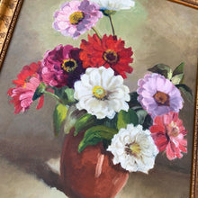 Load image into Gallery viewer, Breathtaking beautiful original vintage floral still life oil painting on board of zinnia flowers in shades of red, deep pink and white a deep ochre vessel on a green mottled background. Signed by the artist, B. Albert. Framed in gold toned, black spattered wood. Lovingly crafted, this one-of-a-kind piece will add an exquisite touch of warmth to your home decor.