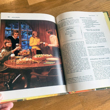 Load image into Gallery viewer, Better Homes and Gardens is known for its fabulous cookbooks. This hardcover cookbook focuses on fondue and tabletop cooking inspired recipes. Its 96 pages are filled with amazing recipes along with many colour photographs. Originally published by Meredith Corporation, USA, 1970. First edition, eleventh printing 1973. In great vintage condition with normal age-related yellowing.