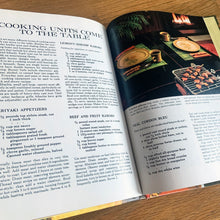 Load image into Gallery viewer, Better Homes and Gardens is known for its fabulous cookbooks. This hardcover cookbook focuses on fondue and tabletop cooking inspired recipes. Its 96 pages are filled with amazing recipes along with many colour photographs. Originally published by Meredith Corporation, USA, 1970. First edition, eleventh printing 1973. In great vintage condition with normal age-related yellowing.