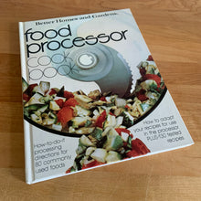 Load image into Gallery viewer, Better Homes and Gardens is known for its fabulous cookbooks. This hardcover cookbook focuses on Food Processor recipes. Its 96 pages are filled with amazing recipes along with many colour photographs. Originally published by Meredith Corporation, USA, 1979. This is the seventh printing, 1982. In great vintage condition with normal age-related yellowing.