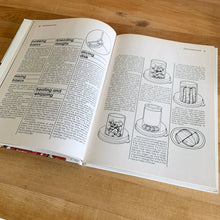 Load image into Gallery viewer, Better Homes and Gardens is known for its fabulous cookbooks. This hardcover cookbook focuses on Food Processor recipes. Its 96 pages are filled with amazing recipes along with many colour photographs. Originally published by Meredith Corporation, USA, 1979. This is the seventh printing, 1982. In great vintage condition with normal age-related yellowing.