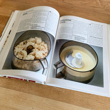 Load image into Gallery viewer, Better Homes and Gardens is known for its fabulous cookbooks. This hardcover cookbook focuses on Food Processor recipes. Its 96 pages are filled with amazing recipes along with many colour photographs. Originally published by Meredith Corporation, USA, 1979. This is the seventh printing, 1982. In great vintage condition with normal age-related yellowing.